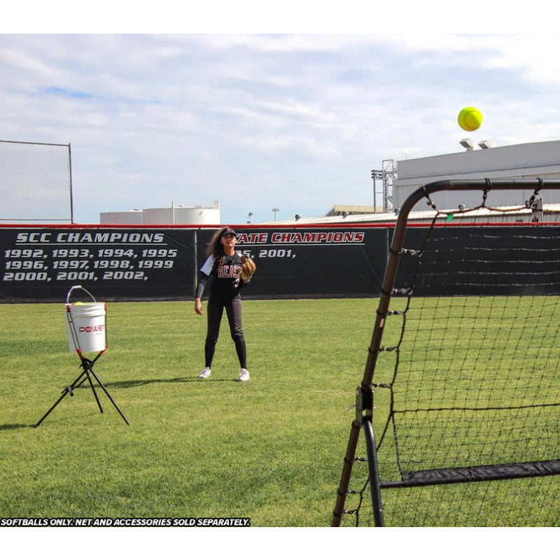 Powernet Practice Softballs 12 PK Recreation Grade in a field